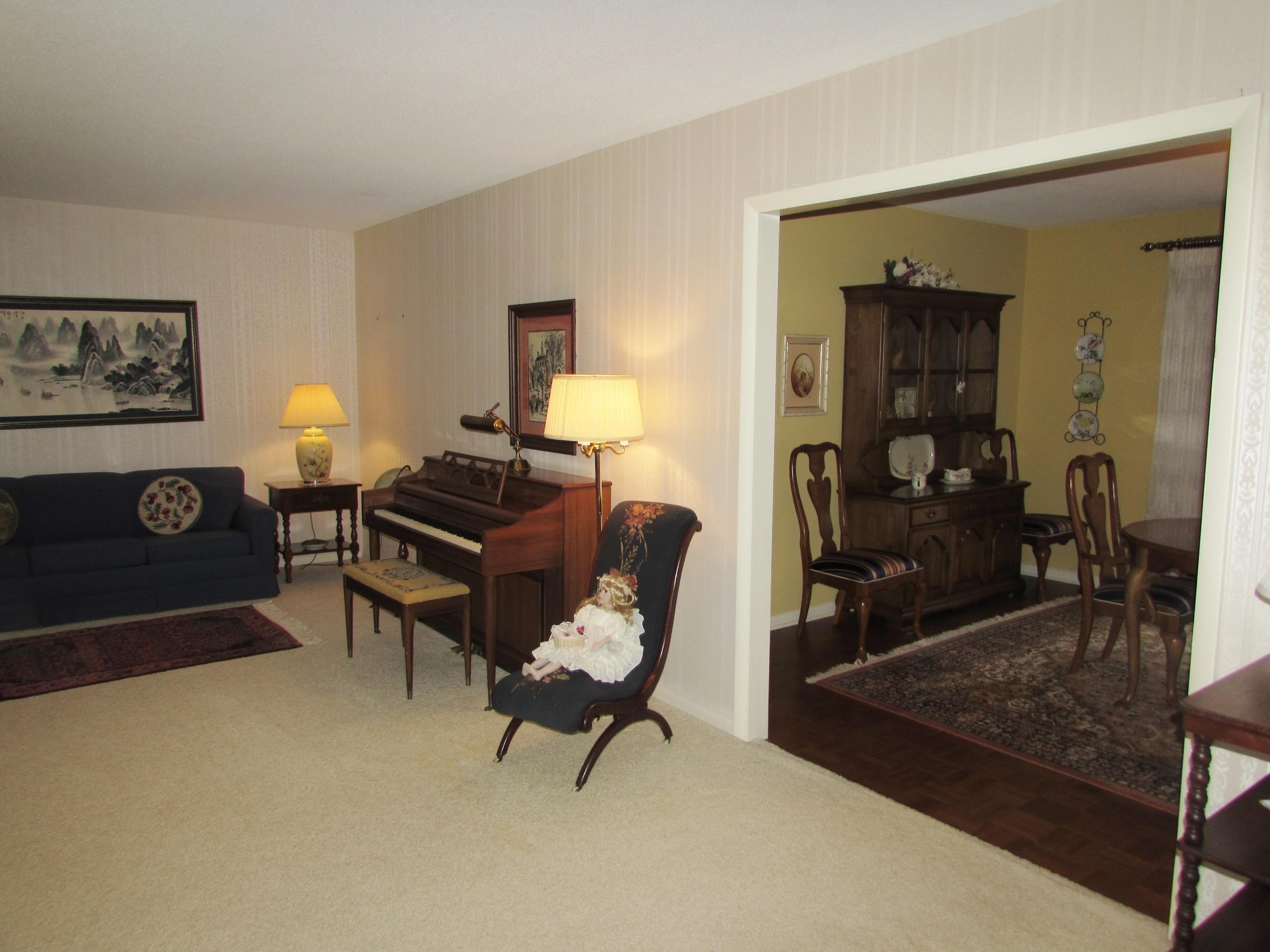 8710 Igou Gap Road Chattanooga, TN 37421 - Photo 7 of 28 Living room opens up to dining room