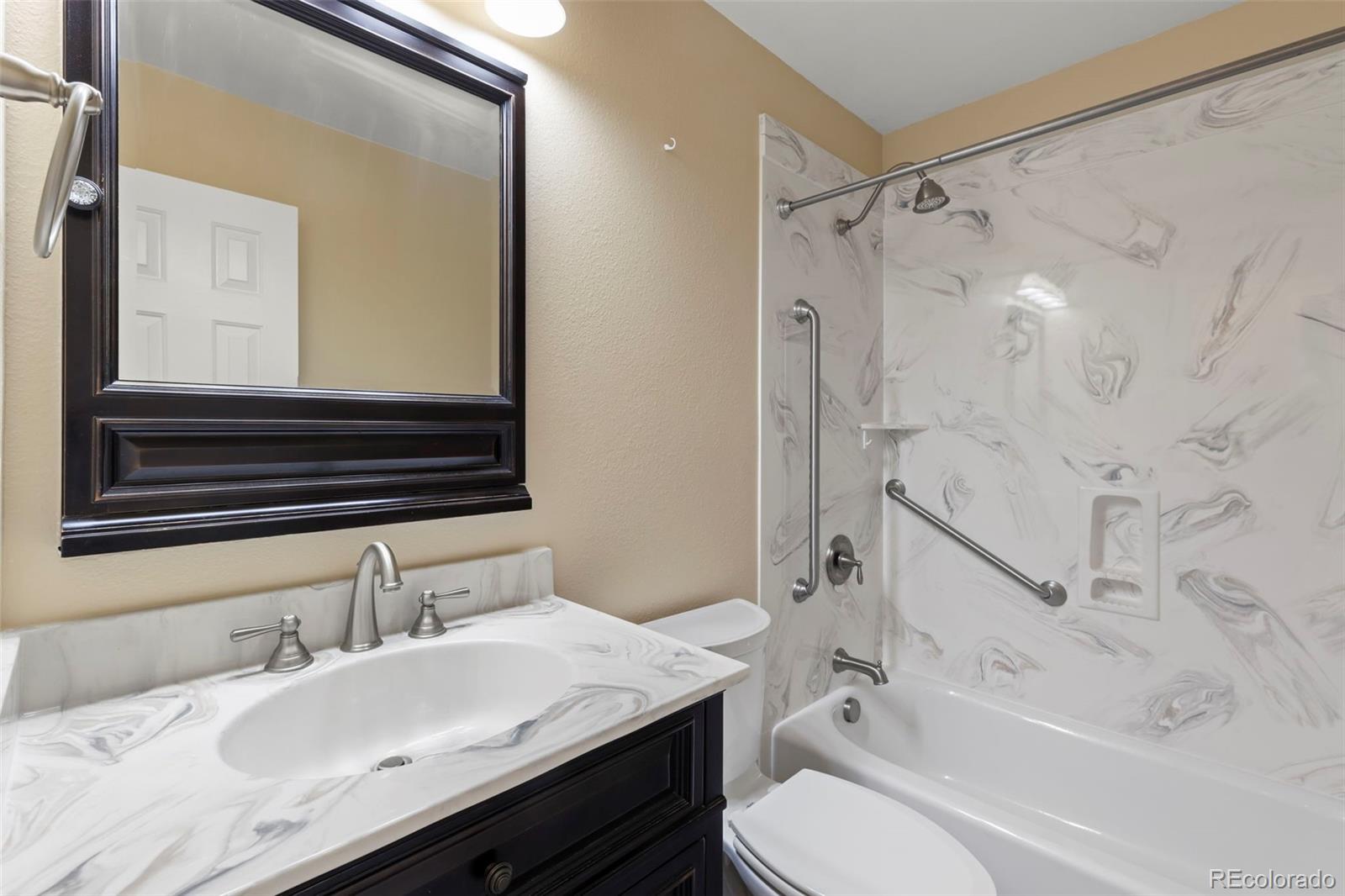 154 High Meadows Drive Florence, CO 81226 - Photo 8 of 27 a bathroom with a sink and a mirror