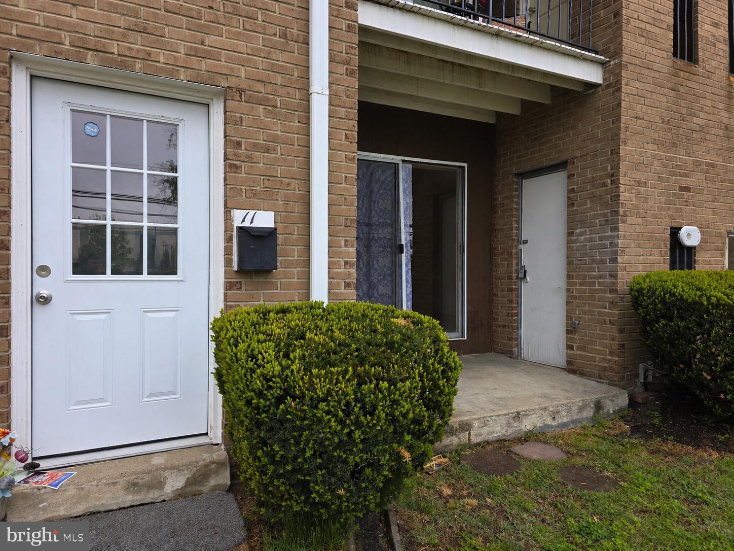 1294 Cooper Street, Unit A11 Beverly, NJ 08010 - Photo 2 of 10 a front view of a house
