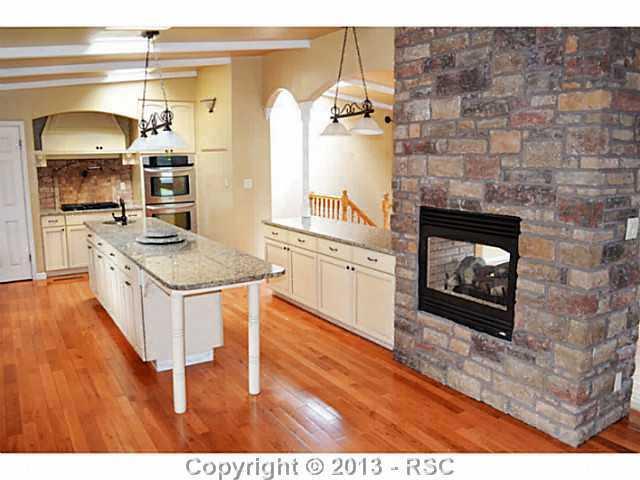 960 Hidden Valley Road Colorado Springs, CO 80919 - Photo 3 of 21 Spacious gourmet kitchen.