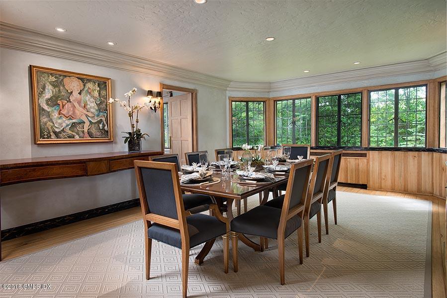 21 Konittekock Road Greenwich, CT 06831 - Photo 8 of 23 a view of a dining room with furniture window and outside view