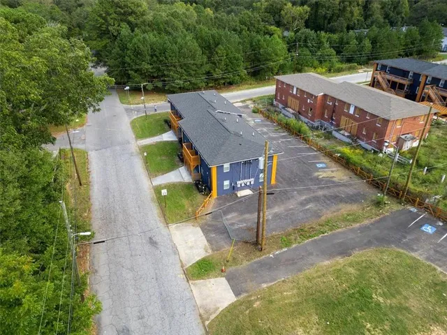 an aerial view of a house with a garden