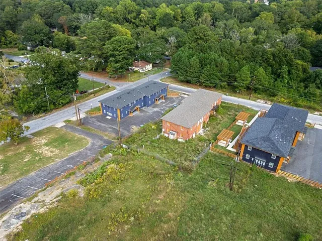 an aerial view of a house with garden space