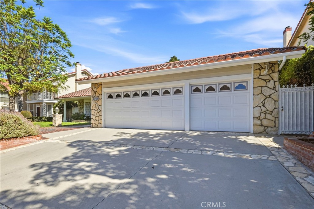 18233 Charlton Lane Porter Ranch, CA 91326 - Photo 3 of 40 a front view of a building