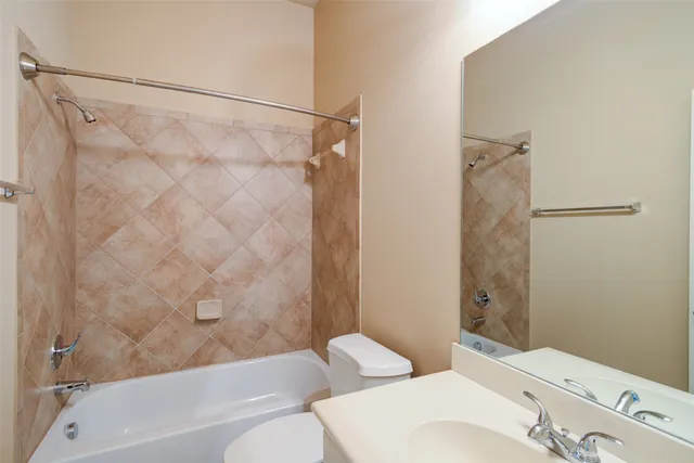 a bathroom with a sink and a toilet