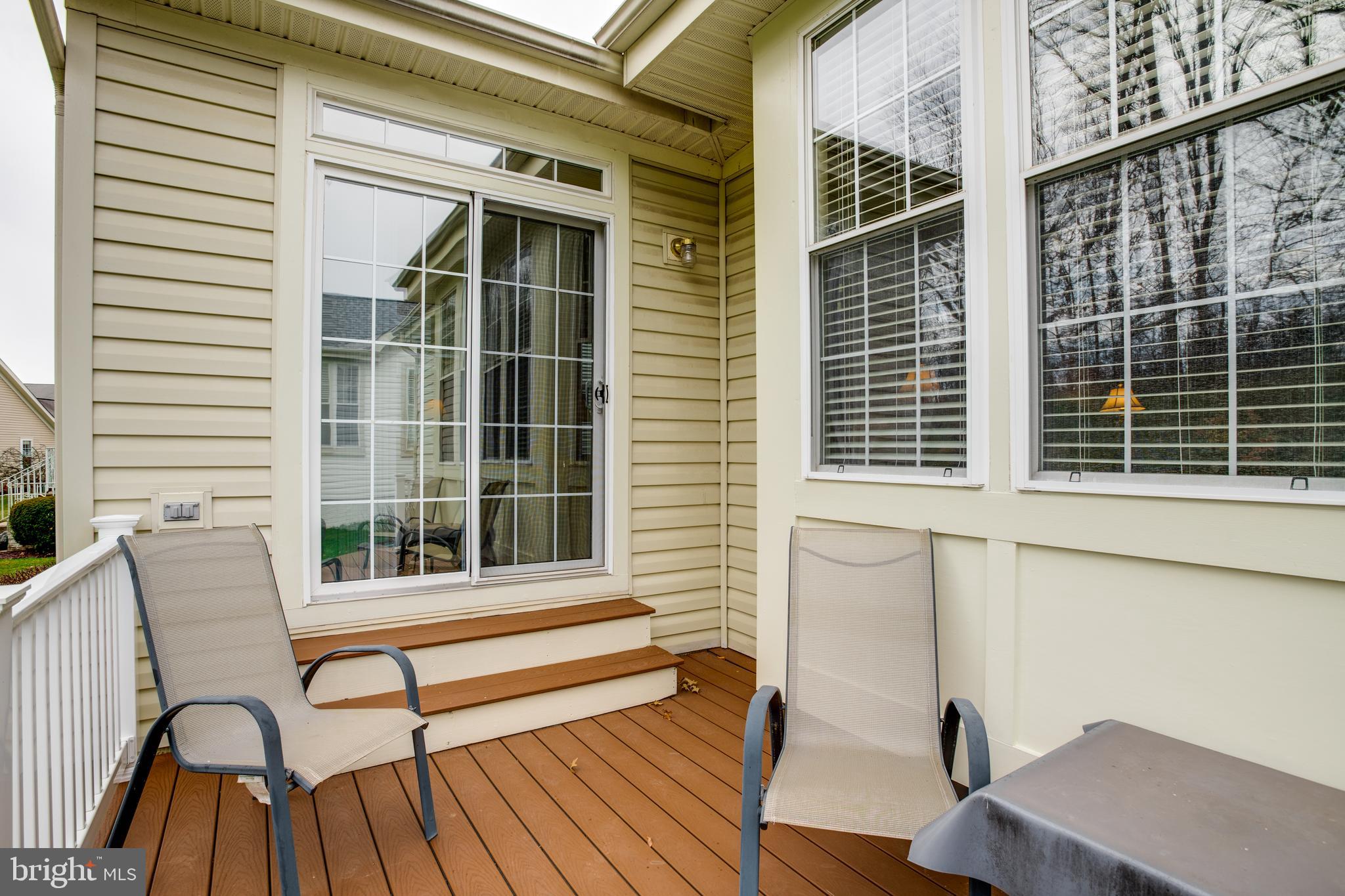 13533 Ryton Ridge Lane Gainesville, VA 20155 - Photo 32 of 65 Composite deck off sunroom