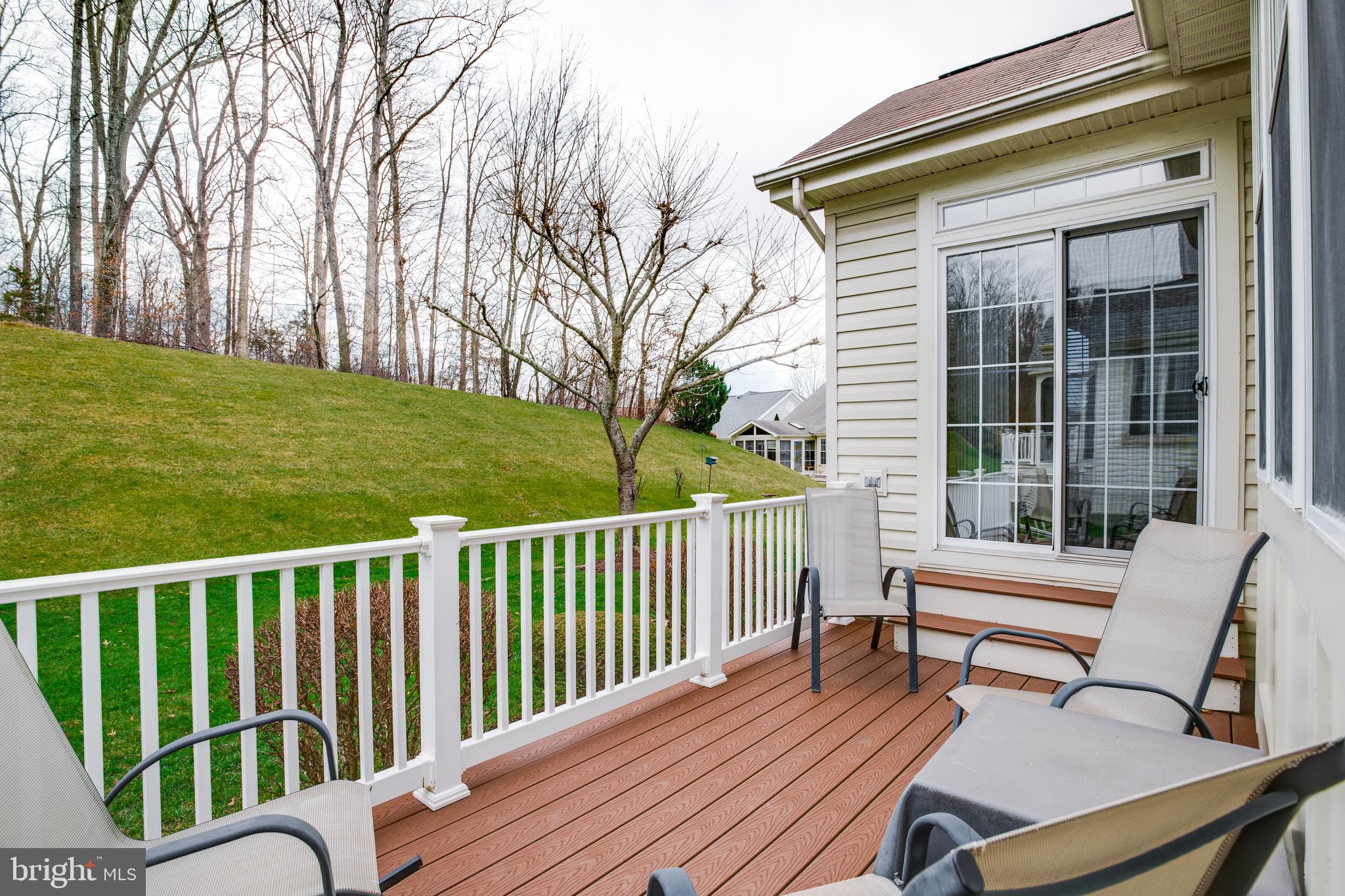 13533 Ryton Ridge Lane Gainesville, VA 20155 - Photo 33 of 65 Composite deck backing to woods