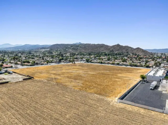 a view of an ocean and a mountain