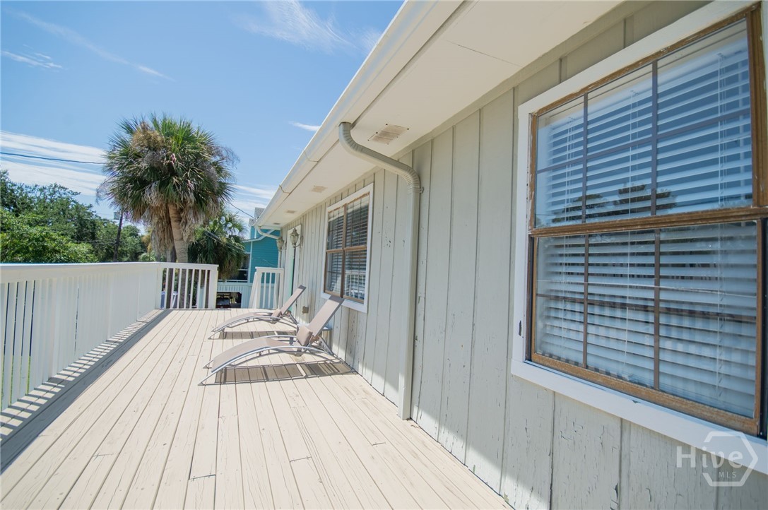 5 5th Avenue Tybee Island, GA 31328 - Photo 17 of 46 Entrance to deck off sunroom.