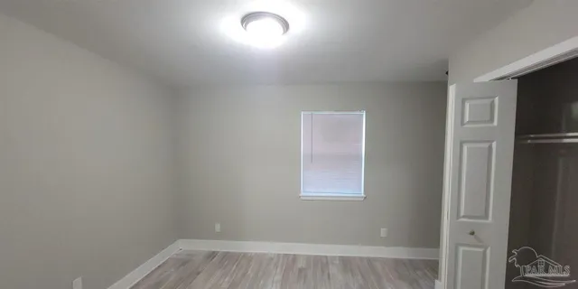 a view of a room that has a window in it