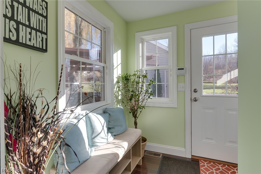 11516 Girdled Road Painesville, OH 44077 - Photo 12 of 24 This mud room and/or drop off area is so accommodating when you enter the back door. Room here for a nice bench area to take off and store your shoes to maintain a clean home.