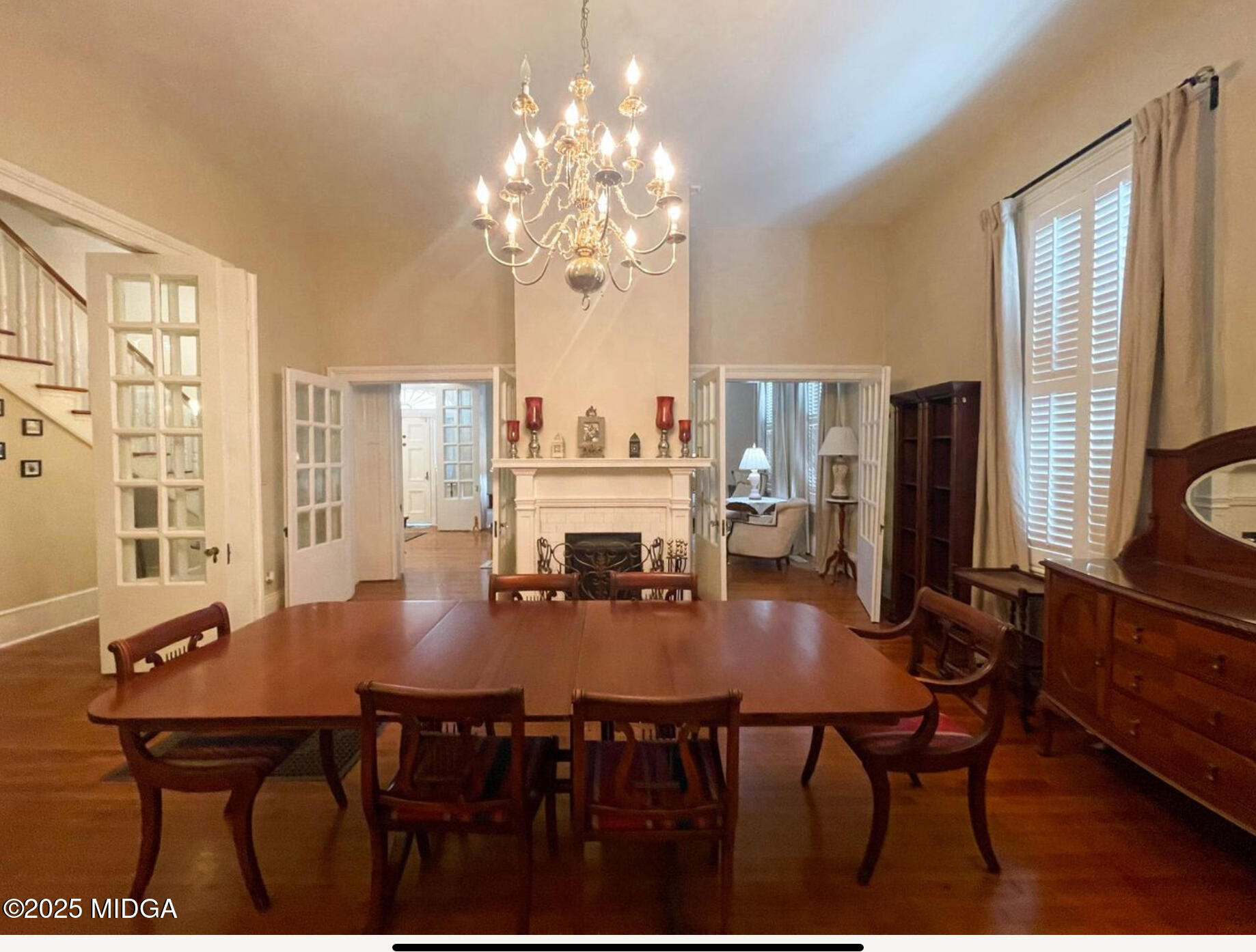 305 Orange Street Macon, GA 31201 - Photo 11 of 35 a view of a dining room with furniture and chandelier