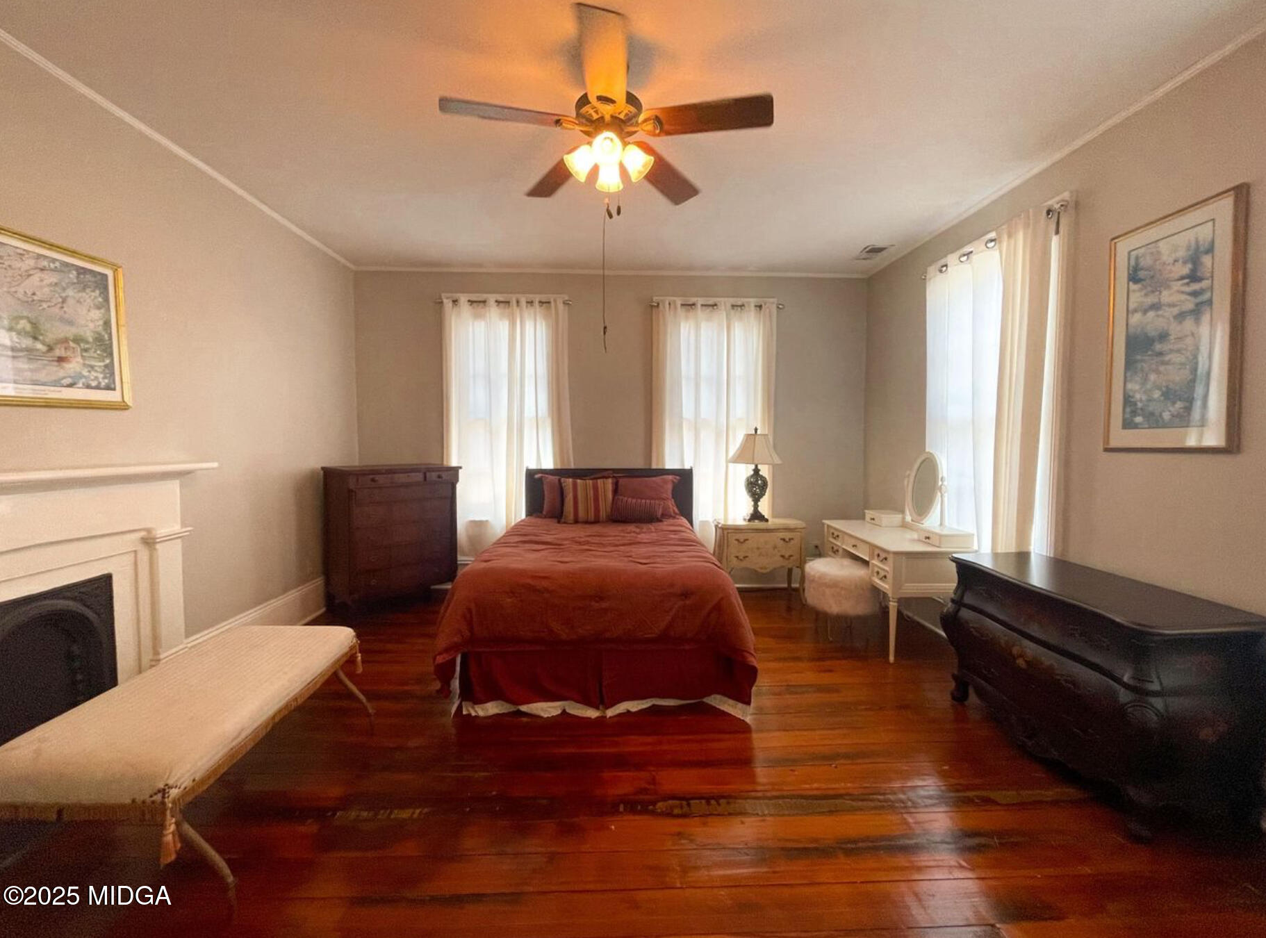 305 Orange Street Macon, GA 31201 - Photo 18 of 35 a living room with furniture fireplace and a window
