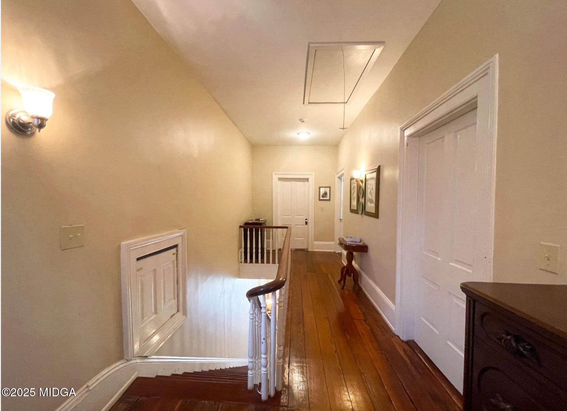 305 Orange Street Macon, GA 31201 - Photo 21 of 35 a view of a hallway with wooden floor and staircase