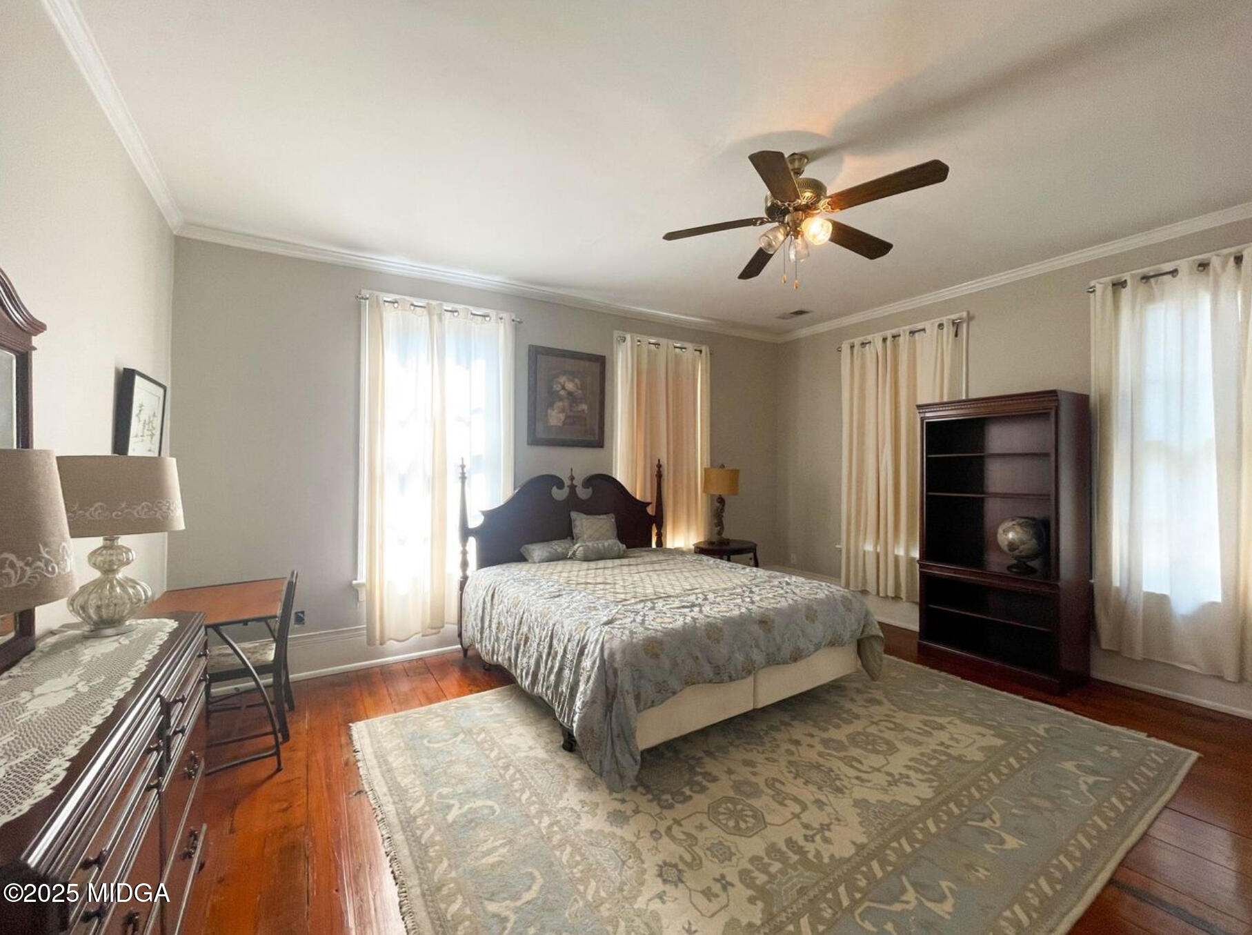 305 Orange Street Macon, GA 31201 - Photo 23 of 35 a bedroom with a bed dresser and a window