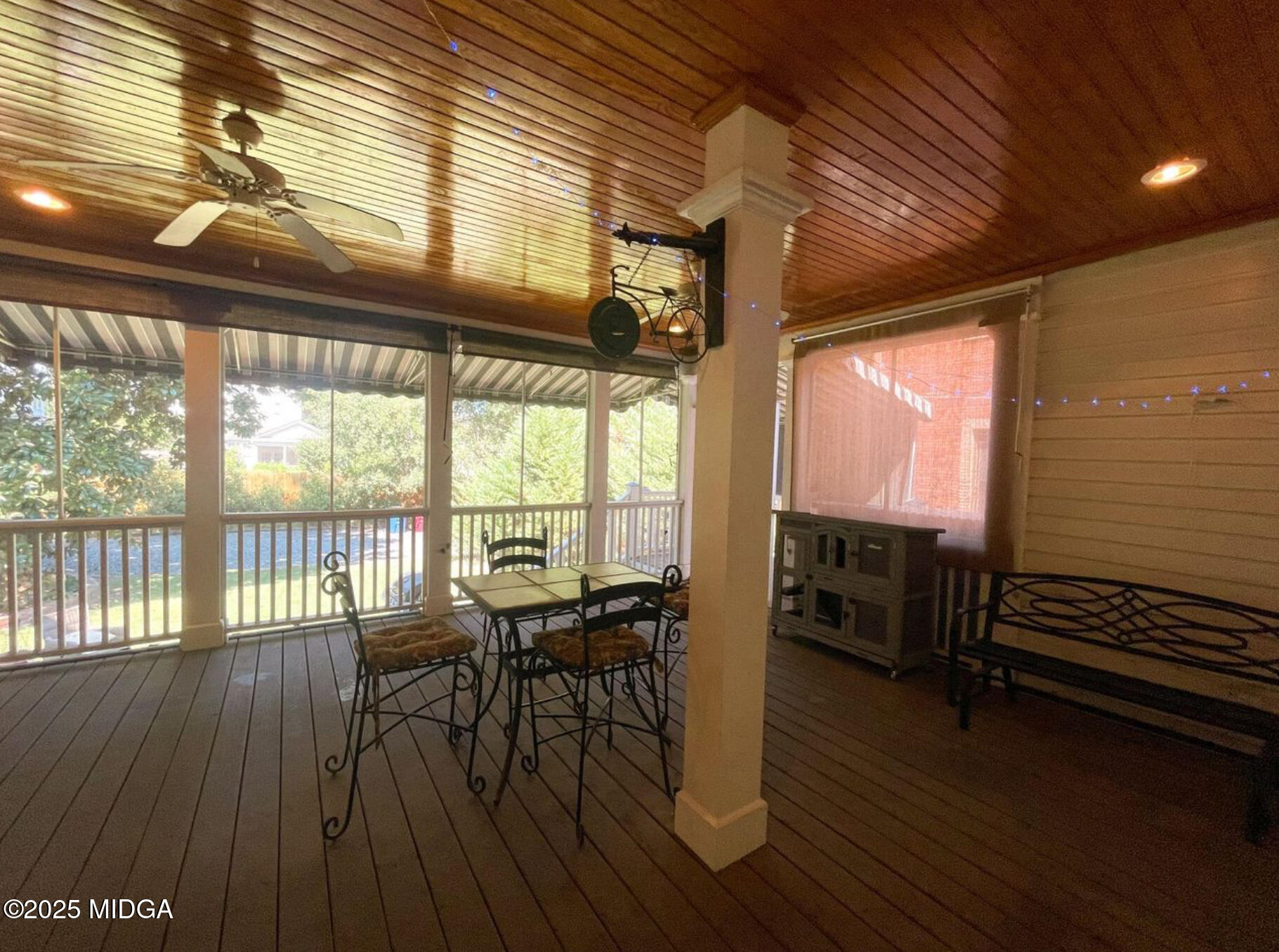 305 Orange Street Macon, GA 31201 - Photo 31 of 35 a view of a dining room with furniture window and wooden floor