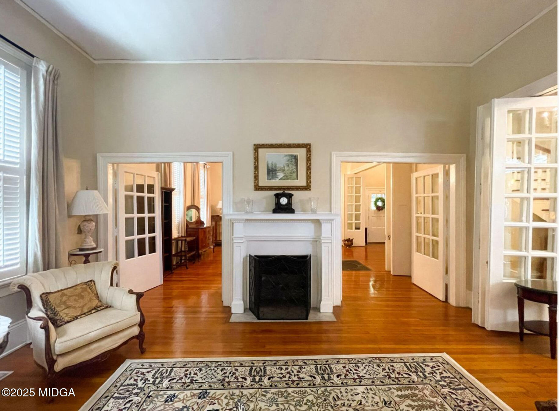 305 Orange Street Macon, GA 31201 - Photo 8 of 35 a living room with furniture and a fireplace