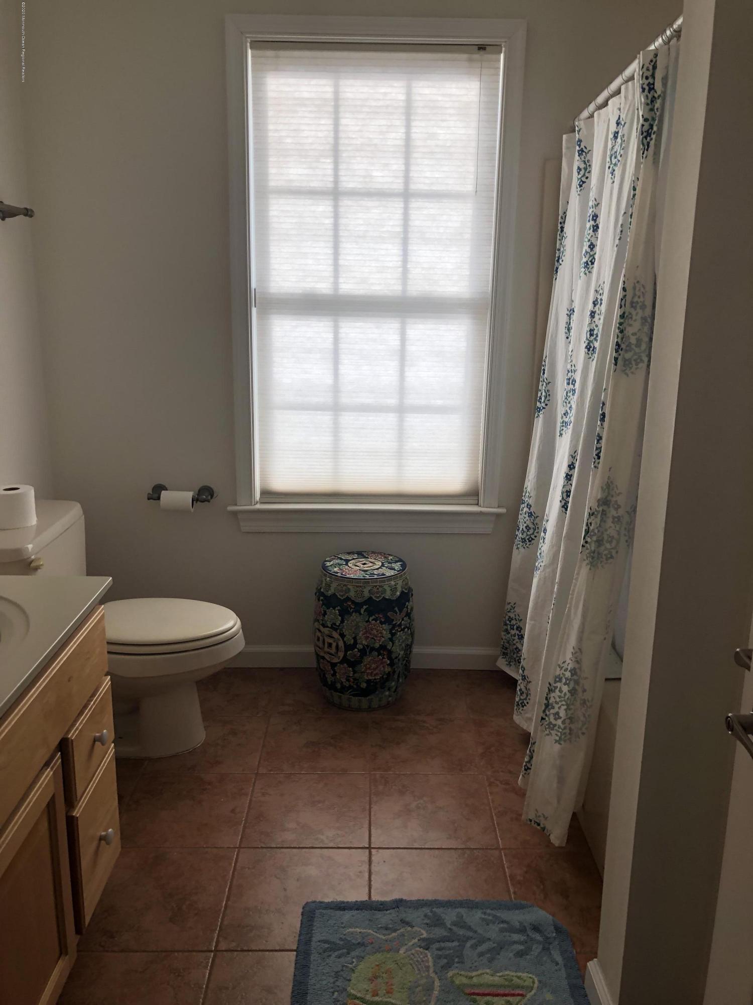 32 North Potter Avenue Manasquan, NJ 08736 - Photo 17 of 32 a bathroom with sink toilet and window