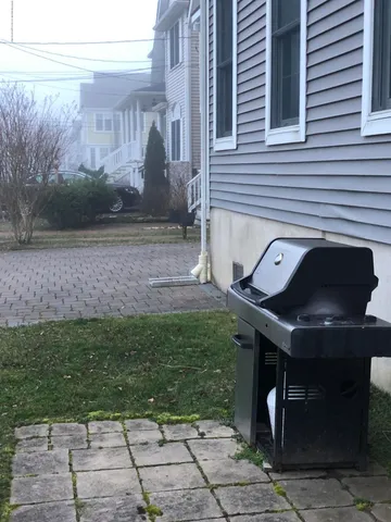 a view of a back yard of the house
