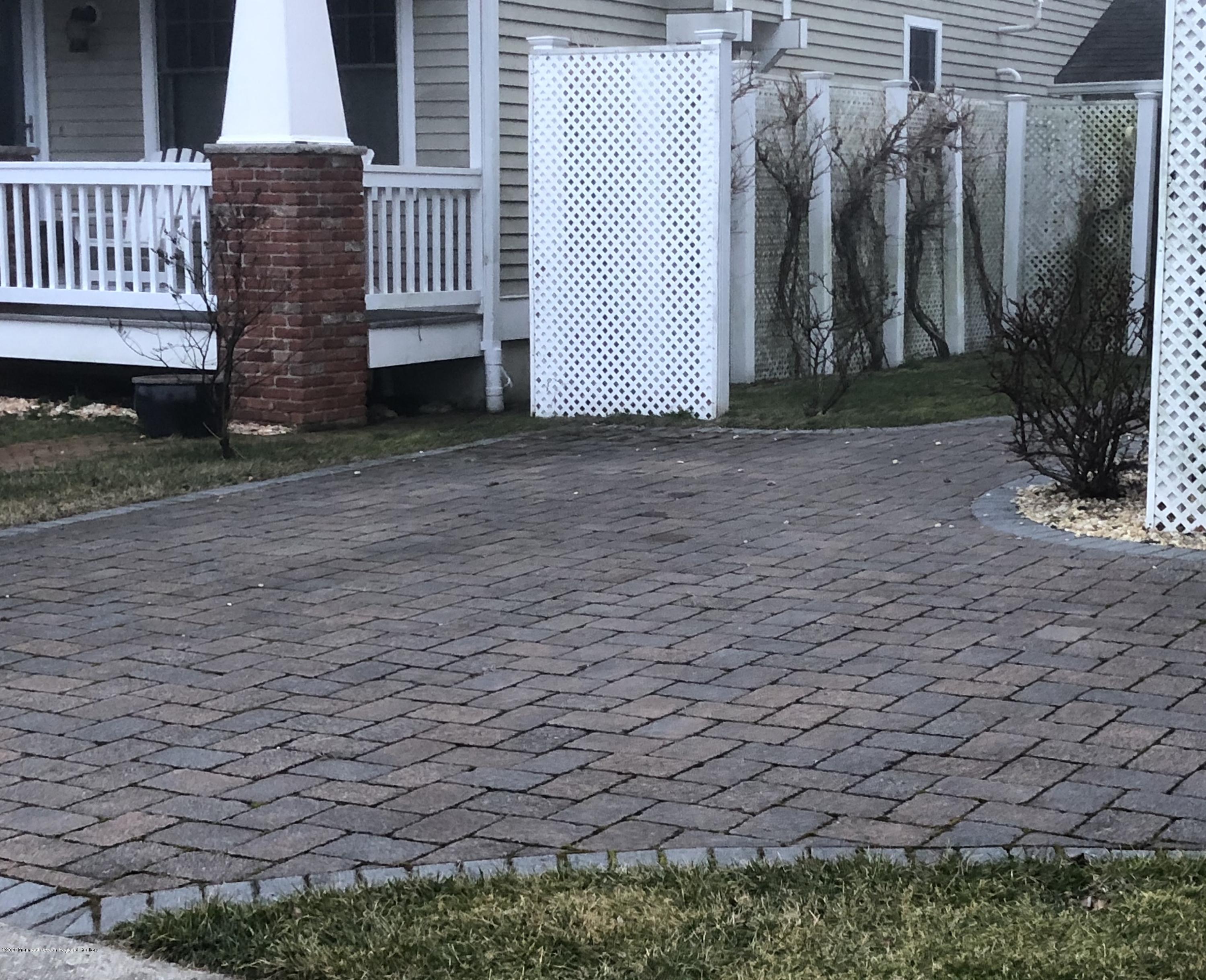 32 North Potter Avenue Manasquan, NJ 08736 - Photo 25 of 32 a view of a porch with a yard