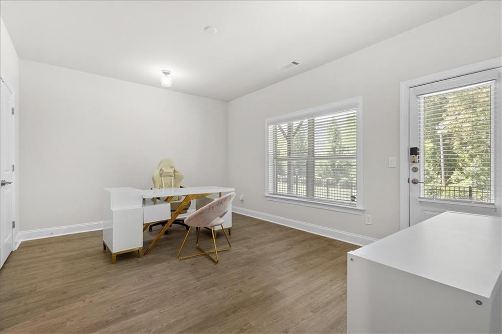 2056 Violet Lane Brookhaven, GA 30319 - Photo 14 of 54 a workspace with wooden floor