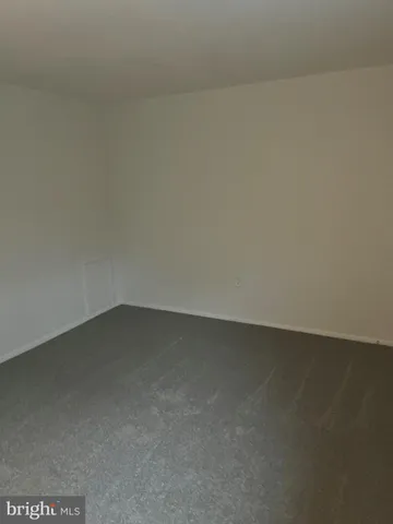 a kitchen that has countertops with windows