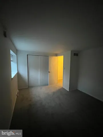a view of empty room with a window