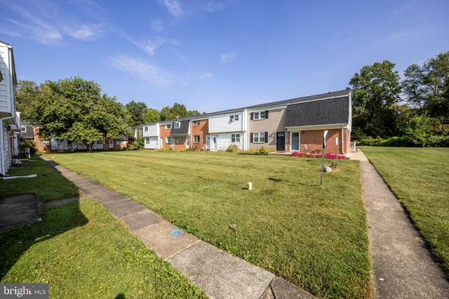 a view of a house with a big yard