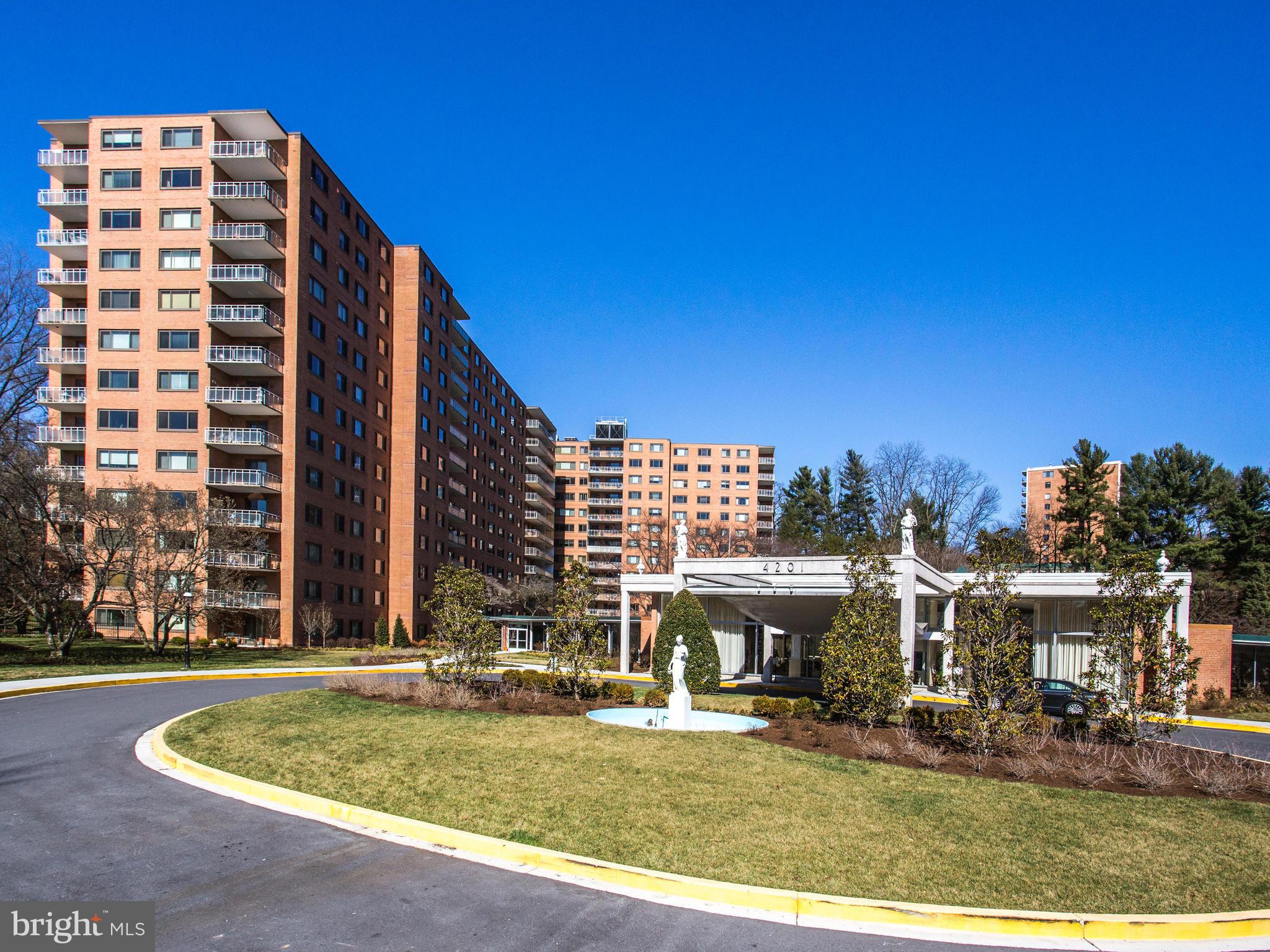 4201 Cathedral Avenue Northwest, Unit 703W Washington, DC 20016 - Photo 17 of 20 a front view of building with yard