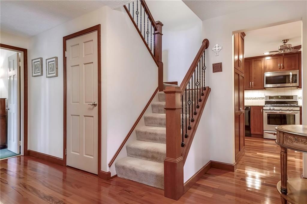 161 North Jamestown Road Coraopolis, PA 15108 - Photo 2 of 25 Stunning entry with new hardwood flooring and updated staircase.