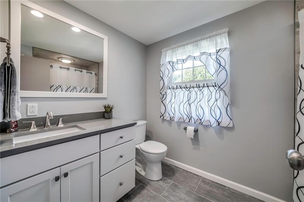 161 North Jamestown Road Coraopolis, PA 15108 - Photo 21 of 25 This updated full bath services the 3 additional bedrooms in the home.
