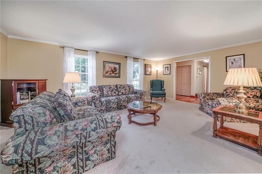 161 North Jamestown Road Coraopolis, PA 15108 - Photo 10 of 25 The large and welcoming living room is an ideal place to entertain family and guests.
