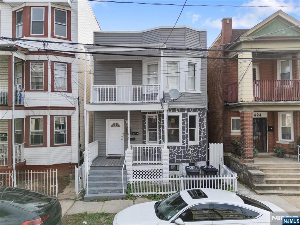 422 Jelliff Avenue, Unit 1 Newark, NJ 07112 - Photo 1 of 14 front view of a house with a door