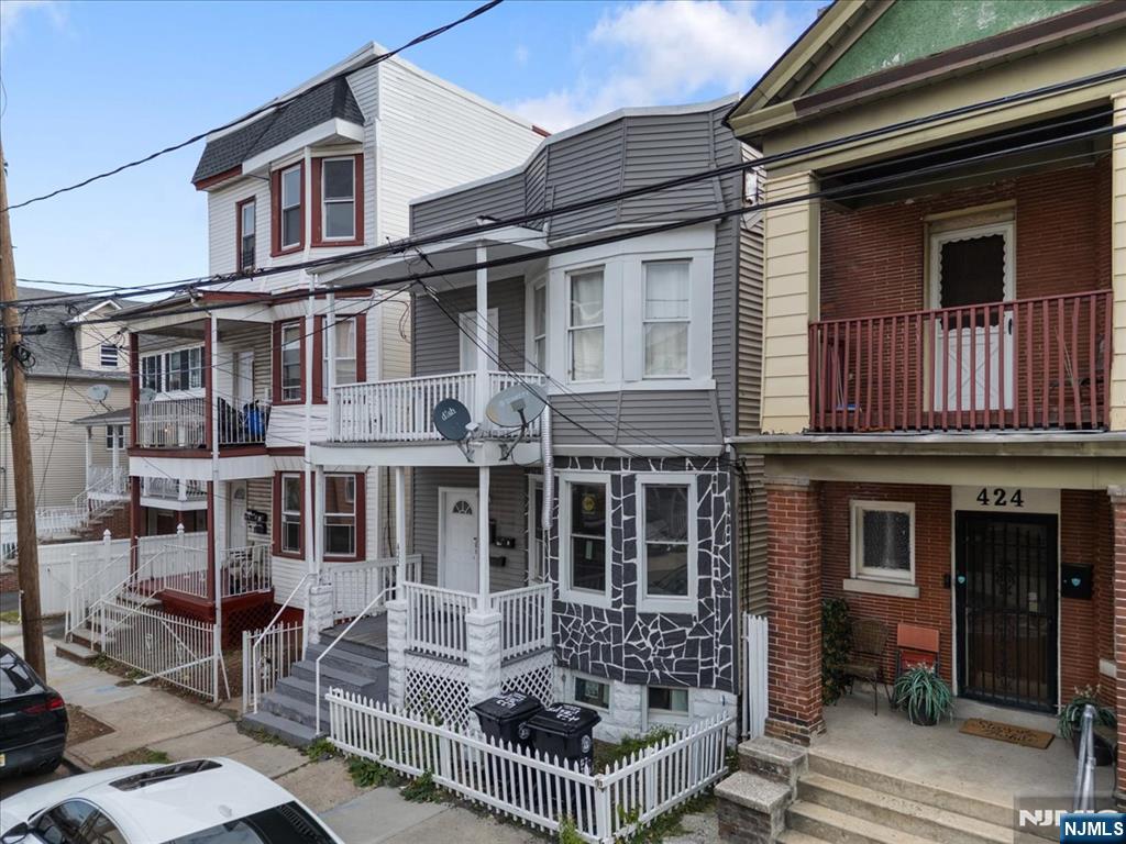422 Jelliff Avenue, Unit 1 Newark, NJ 07112 - Photo 14 of 14 a front view of a house with balcony
