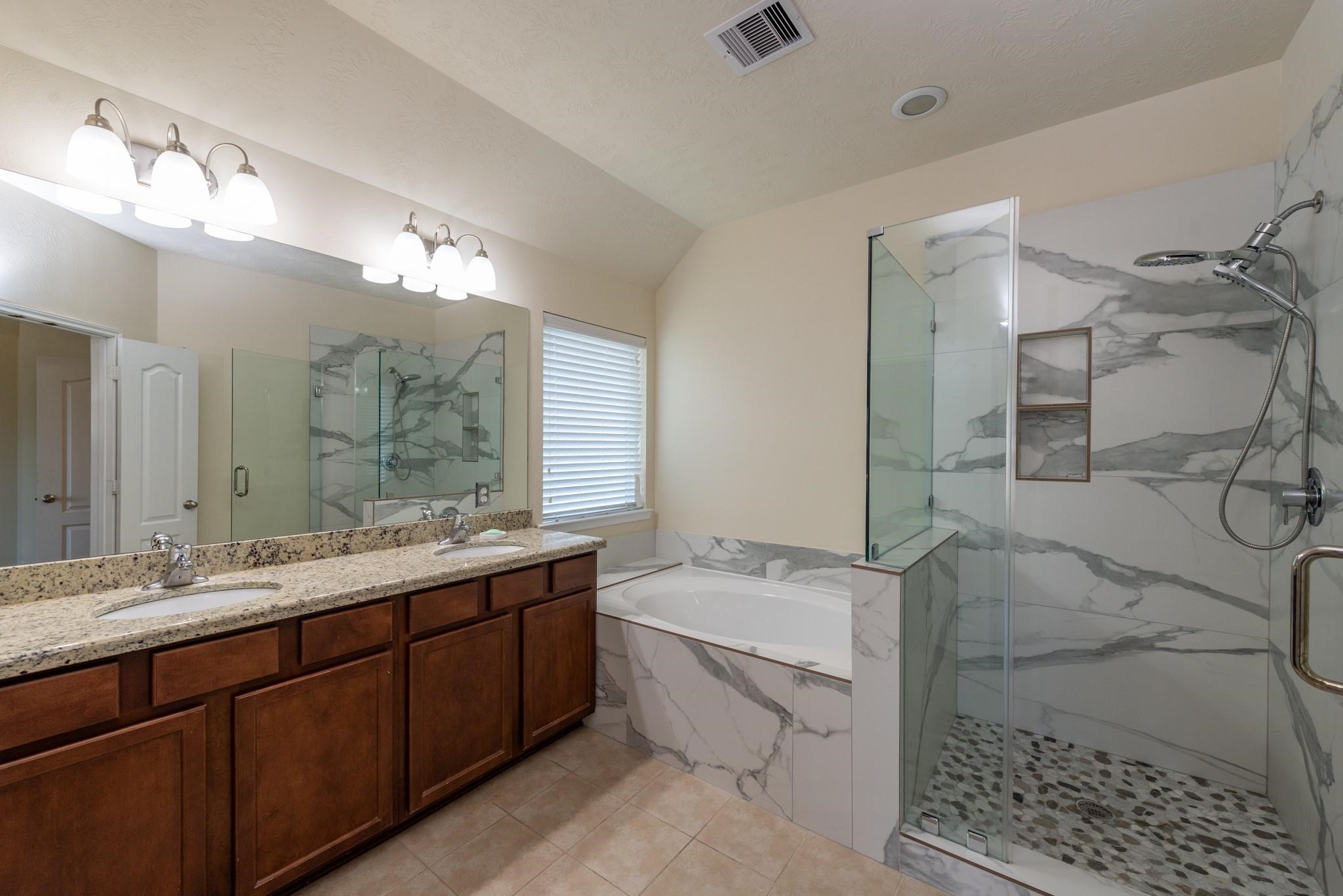 6402 Addlestone Ridge Lane Katy, TX 77494 - Photo 15 of 25 Thoughtfully updated and beautifully finished, this spa-like retreat offers both luxury and functionality.