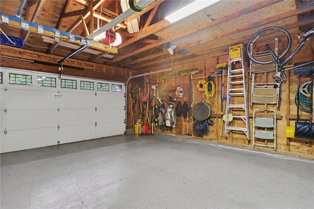 10 High Point Drive Parma, NY 14559 - Photo 20 of 28 Epoxy floor in the garage. LiftMaster opener with