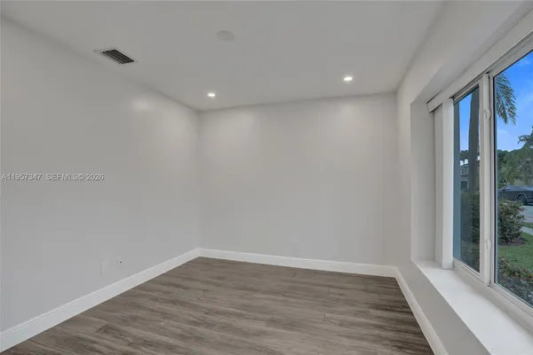 a view of an empty room with window