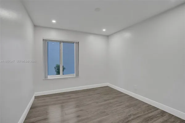 a bathroom with a double vanity sink mirror and double