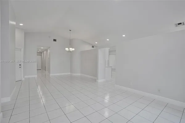 a view of a backyard of the house