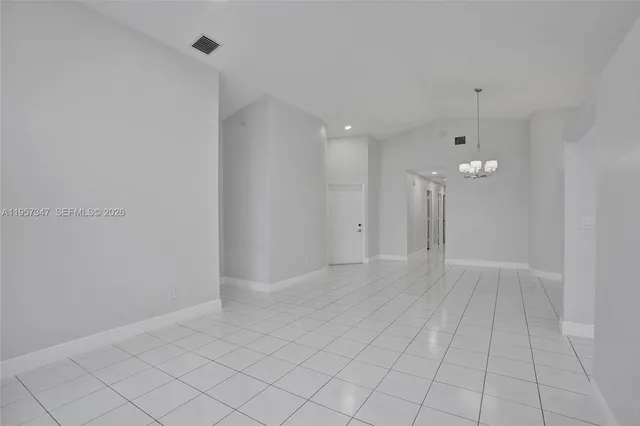 a bathroom with a sink vanity and mirror