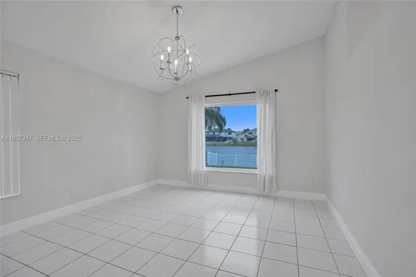 a view of outdoor space with garden and trees