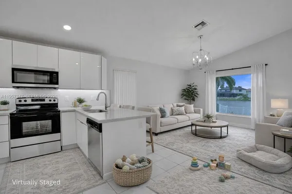 a view of hallway with wooden floor