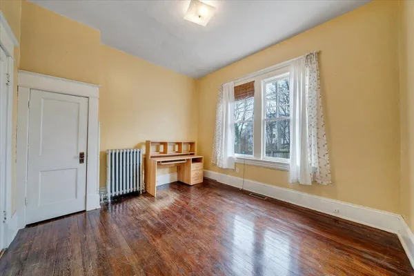 a bathroom with a sink a toilet and bathtub