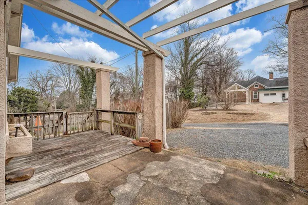 a view of a porch with a bench