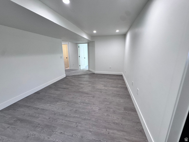 4729 Middleboro Road Herriman, UT 84096 - Photo 7 of 19 Spacious room featuring wood-finish flooring and recessed lighting