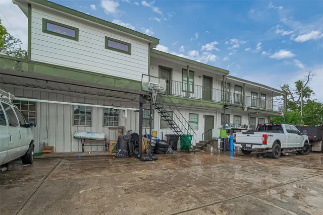 a front view of a house with parking space