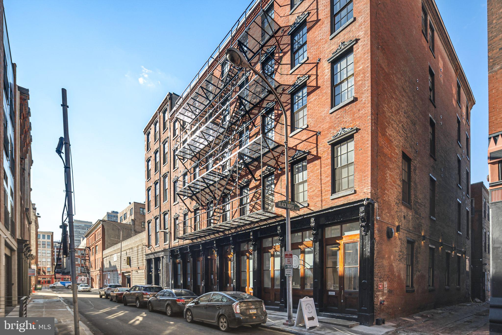 20 Letitia Street, Unit 2B & 2C Philadelphia, PA 19106 - Photo 1 of 9 a city street lined with buildings and cars