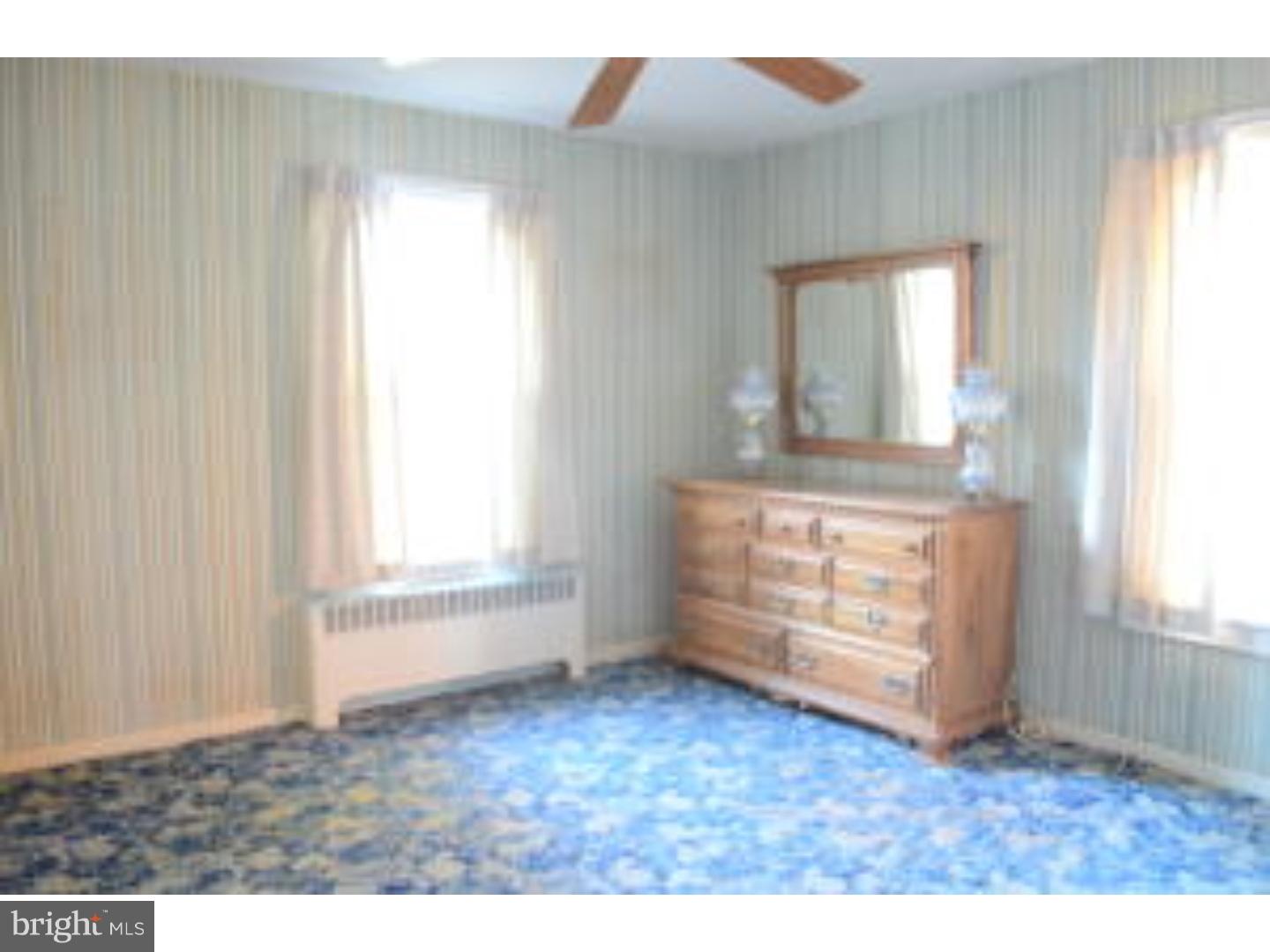 205 Old Fritztown Road Reading, PA 19607 - Photo 14 of 25 an empty room with windows and closet