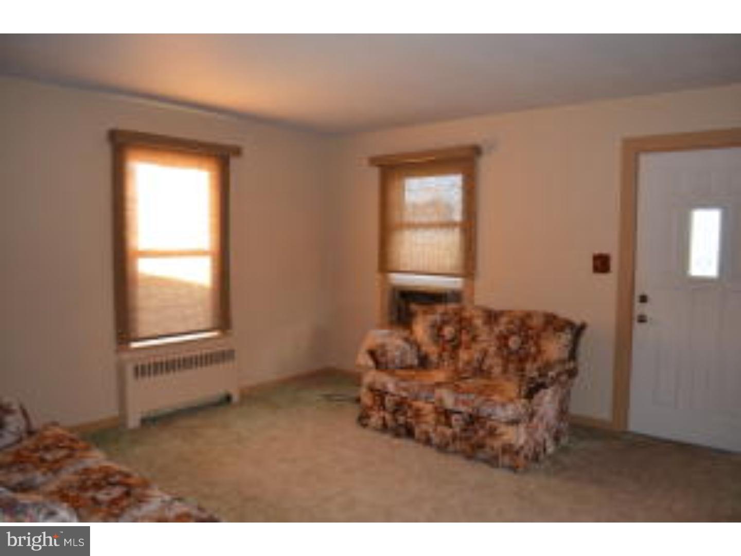 205 Old Fritztown Road Reading, PA 19607 - Photo 17 of 25 a living room with furniture and a window