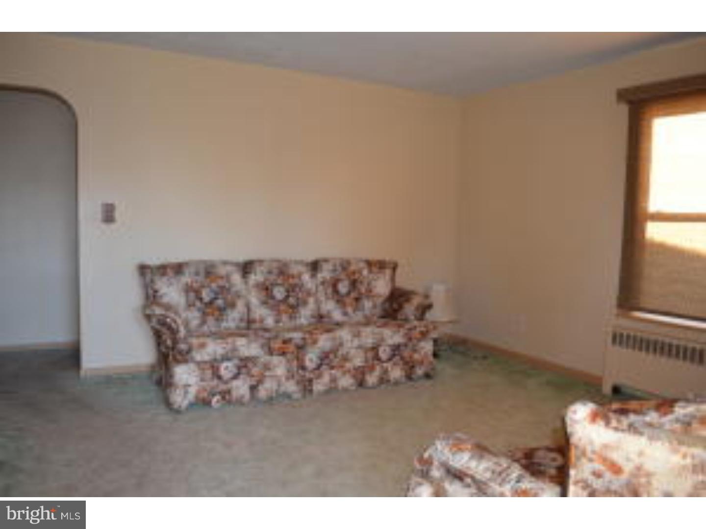 205 Old Fritztown Road Reading, PA 19607 - Photo 19 of 25 a living room with a couch